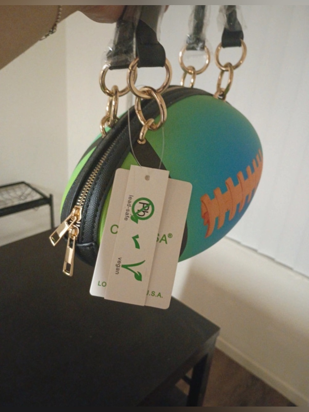 NWT-Rugby Teal & Lime
Whimsical Festival pebble textured football handbag - Picture 2 of 10